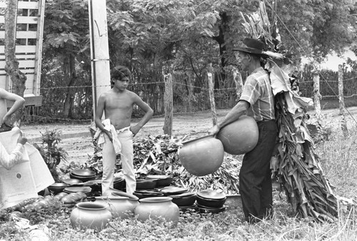 Transporting clay goods, La Chamba, Colombia, 1975