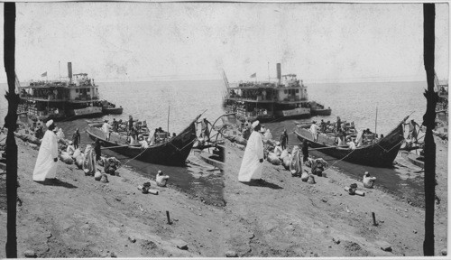 Sudanese passengers waiting to board a river steamer. Khartum. Anglo-Egyptian Sudan
