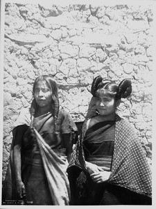 Hopi Indian woman and her daughter in the village of Oraibi, showing a close-up view, ca.1901