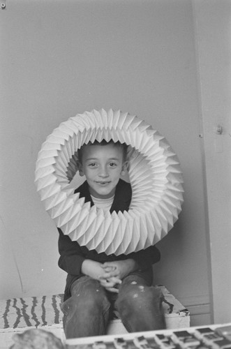 Peter Linenthal, wearing folded paper halo