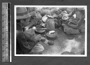 Men preparing food, Tibet, China, ca.1941