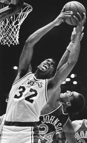 Magic Johnson goes to score during Western Conference Semifinals
