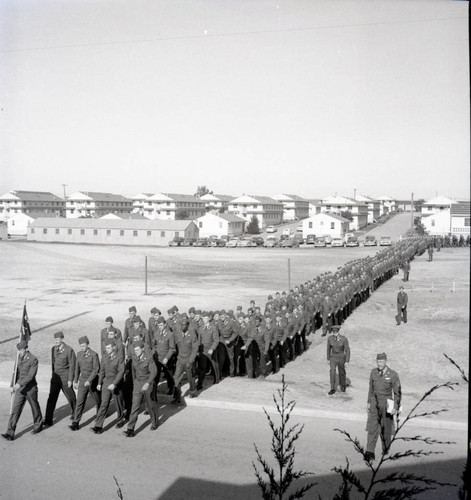 Trainees marching in procession at Fort Ord
