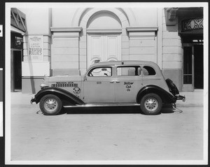 Side view of a 1936 Yellow Cab Company DeSoto taxi, ca.1936