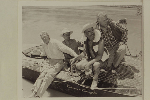 The crew of the motorboat "Hudson" at Lees Ferry just before the start of the run through Marble and Grand Canyons. Joe Desloge; Guy Forcier; Otis Marston; Jordan Rust