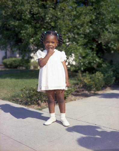 Child in white dress
