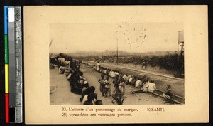 Group waiting at train station, Kisantu, Congo, ca.1920-1940
