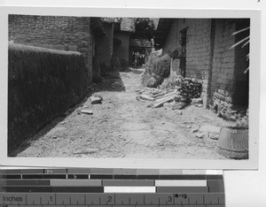 A street scene at a village at Luojing, China, 1935