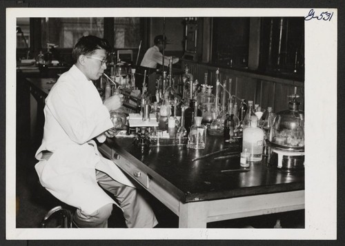 Mr. Harold Arase, Jerome, seems to know what is in all the bottles, and he is very successful in his work as laboratory technician at the Lankenau Hospital, Philadelphia. Philadelphia, Pennsylvania