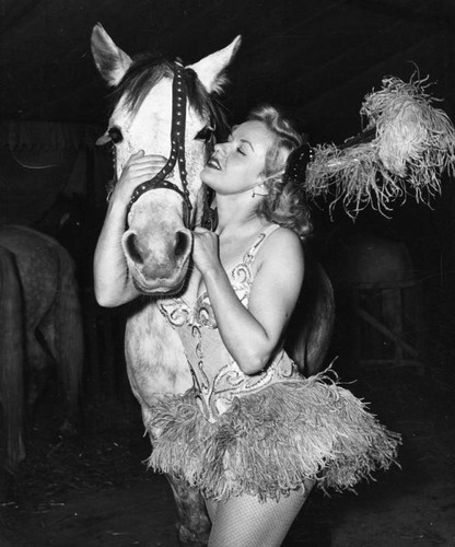 Woman and circus horse
