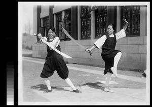 Women students demonstrating martial arts, Yenching University, Beijing, China, 1928
