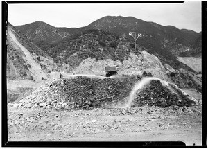 Dump truck in action at the construction of the San Gabriel dam, 1936