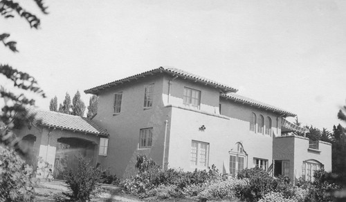 Rear view of Wilson house and gardens, with porte cochere