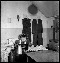[Connie Lautze: woman at sewing machine]