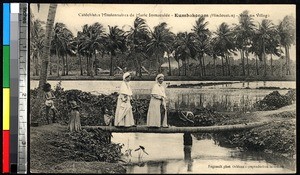Two missionaries crossing a river, Kumbakonam, India, ca.1920-1940