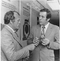 Two men at an Aerojet exhibit