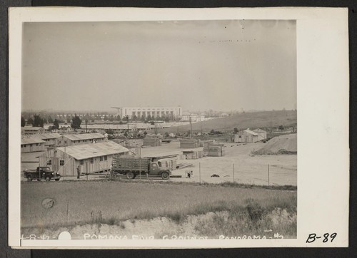 Pomona, Calif.--General view of assembly center being constructed on Pomona Fair Grounds, for evacuees of Japanese ancestry. Evacuees will be assigned to War Relocation Authority centers for the duration. (See B-88 for rest of panorama.) Photographer: Albers, Clem Pomona, California