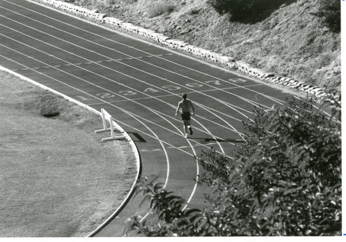 A man student running on the Stotsenberg Track