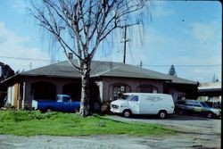 Back of the historic Petaluma & Santa Rosa Railway depot looking west, in use as Clarmark Flower Shop at 261 South Main in Sebastopol