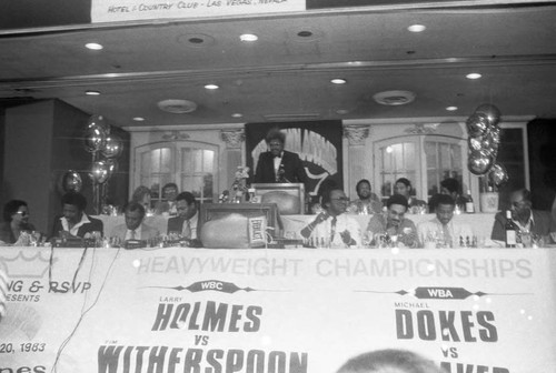Don King speaking at a press conference for the "Crown Affair" boxing event, Los Angeles, 1983