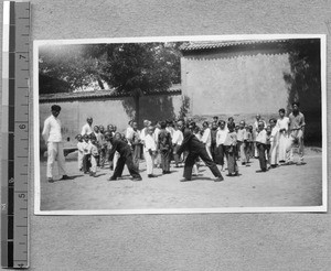 Children exercising at vacation Bible school, Fenyang, Shanxi, China, 1936