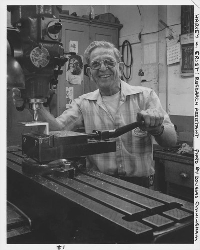 Harvey Crist at the drill press in the Mount Wilson Observatory's machine shop, Pasadena