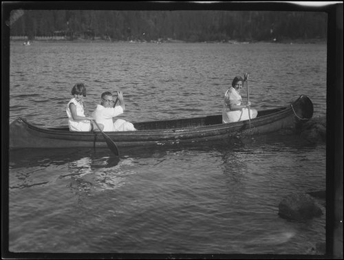 Woman, man, and girl in canoe, Lake Arrowhead, 1929