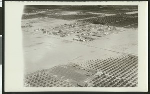 Aerial view of flooding near Anaheim, showing flooding of fields, ca.1930