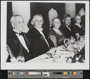 Robert Millikan, Hamlin Garland, Will Rogers, et al., at a dinner, Los Angeles, 1933