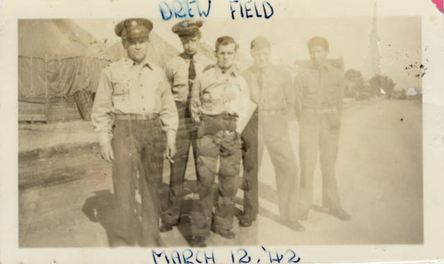 Masaru Shintaku with military soldiers at Drew Field