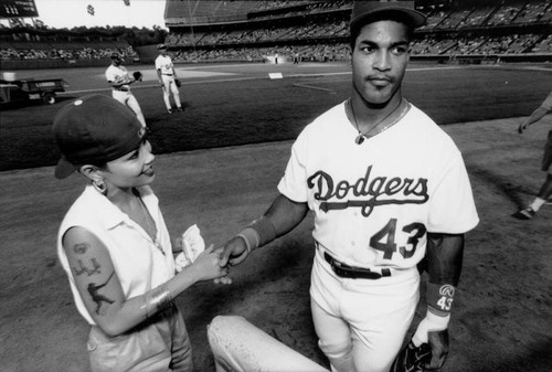 Raul Mondesi with Dodger fan