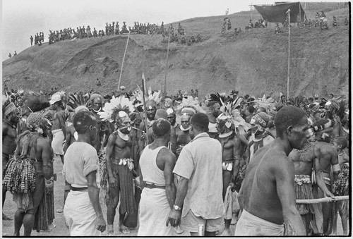 Government-sponsored festival in Tabibuga: luluais and other men discuss distribution of pigs