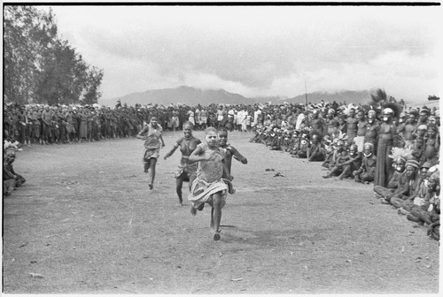 Government-sponsored festival in Tabibuga: adolescent girls run a race ...