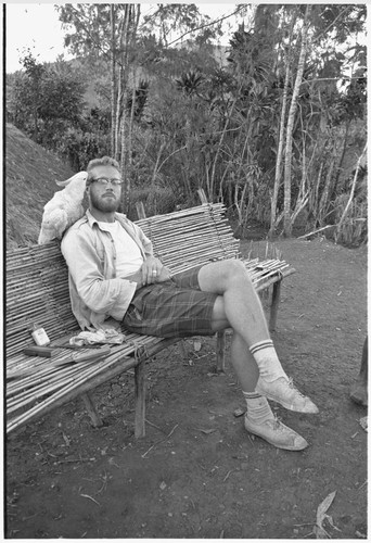 Edwin Cook with Marilyn, a pet cockatoo