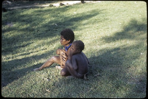 Woman with infant and child