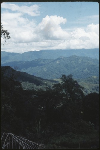 Tabibuga and surrounding moutains, small airplane approaching