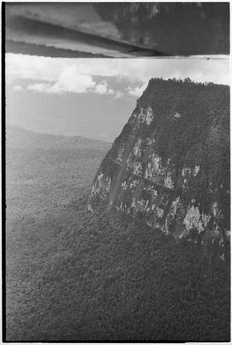 Steep cliff in unidentified mountains