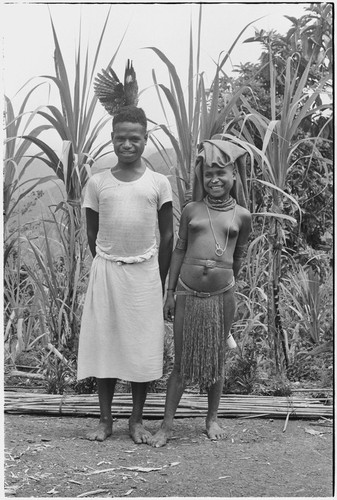 Courtship: adolescents before courtship event, boy wears feather valuable, girl wears trade beads