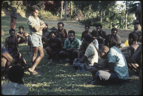 Local court case, mediated by Yingwai, seated center, president of the Jimi River Local Government Council