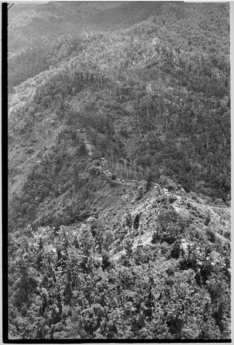 Aerial view of village on mountain ridge