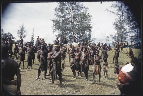 Kwiop census, people wait to be counted by visiting government patrol officer