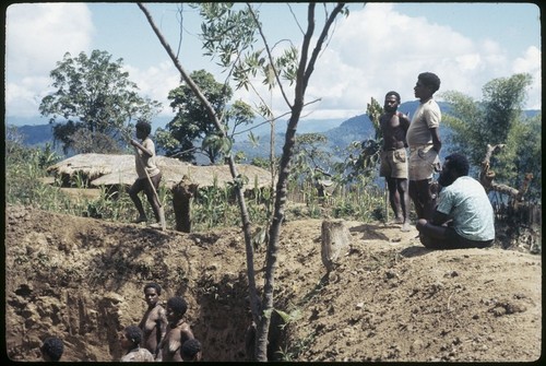 Fish pond being excavated by hand, to be stocked by government with tilapia as source of protein for local diet