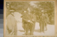 Supervisor Oscar Hooks with cap on and Supervisor Mulvahill with his hat off and John O'Brien reporter on the Examiner with the Panama Hat. 1917