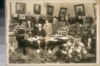 Photo taken in the Chief of Police Office at the Hall of Justice San Francisco. L to R. Mrs. Thos. Walsh, Acting Chief of Police Thos. Walsh, Mrs. Roy D. Graves and Roy D. Graves, on Dec. 30/28. Thos. Walsh was the acting Chief of Police from Dec. 26th 1928 to Jany. 1st 1929 and retired from this office at 12:05 a.m. this date Jany 1st 1929