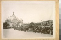 9 years after the fire at the P.P.I.E. [Panama-Pacific International Exposition] [Officials on stand in front of Festival Hall.]