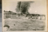 N.E. from the old Jewish Cemetery, 18th & Dolores Sts. The morning of the Great Earthquake and Fire, April 18th, 1906. The Mission High School in center. See the home opposite the School the underpinings [sic] have given away