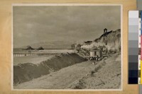 Building the 2nd [unit?] of the Esplanade at the Ocean Beach at the Cliff House. Jany 30/22. See the snow on the Marin hills. It snowed in San Francisco Jany 29/22