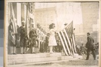 Photo same 1914 [Miss Rolph at the halyard]. [Opening of the Panama Canal]