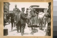Mayor James Rolph Jr. watering the horses at the end of line
