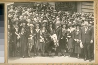 A bunch of movies in front of the City Hall here to celebrate the opening of the Lowe's-Warfield Theatre on Market at Taylor. It's on May 13/22, Saturday Eve. M.M. Sternin, straw hat near Walter Hiers